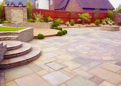 Patio with circle design Indian sandstone